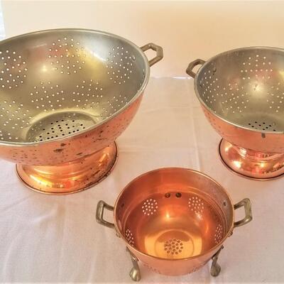 Lot #52  Set of three copper colanders