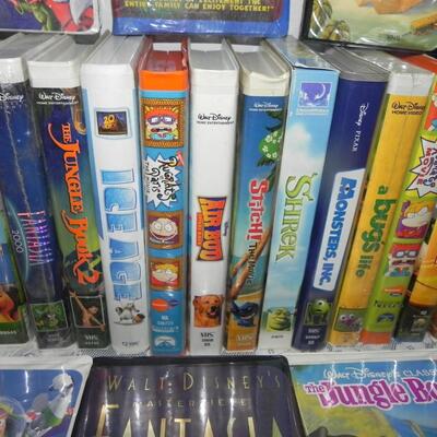 VHS HI FI STEREO VCR PLAYER AND LARGE VARIETY OF DISNEY VHS MOVIES AND OTHERS