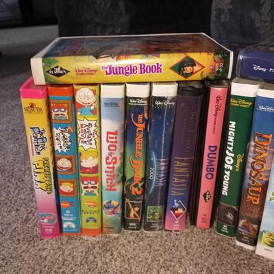 VHS HI FI STEREO VCR PLAYER AND LARGE VARIETY OF DISNEY VHS MOVIES AND OTHERS