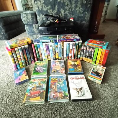 VHS HI FI STEREO VCR PLAYER AND LARGE VARIETY OF DISNEY VHS MOVIES AND OTHERS
