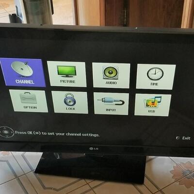 Lot #73  42" LG Flat Screen Tv on Stand - works