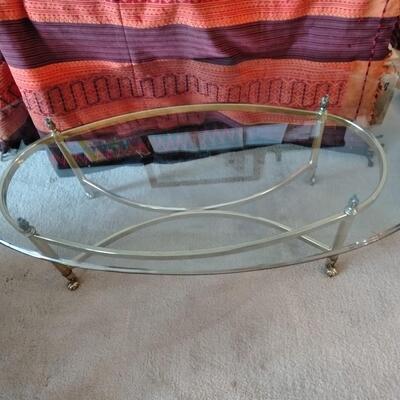 LOT 57 OVAL GLASS & BRASS COFFEE TABLE