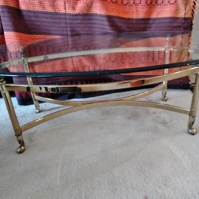 LOT 57 OVAL GLASS & BRASS COFFEE TABLE