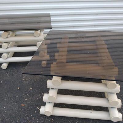 Two glass top tables
