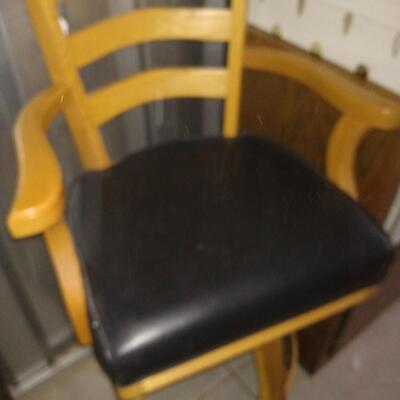 Tall swivel chair