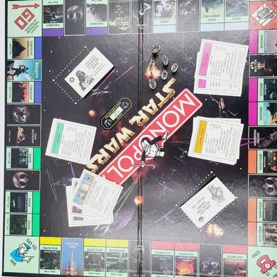 STAR WARS MONOPOLY GAME W/ PEWTER PLAYING PCS.