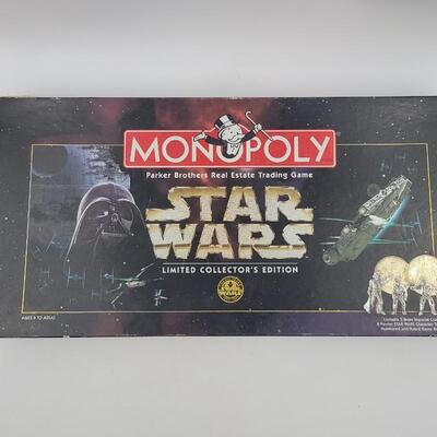 STAR WARS MONOPOLY GAME W/ PEWTER PLAYING PCS.