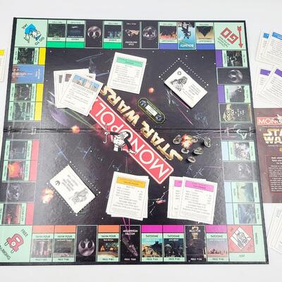 STAR WARS MONOPOLY GAME W/ PEWTER PLAYING PCS.