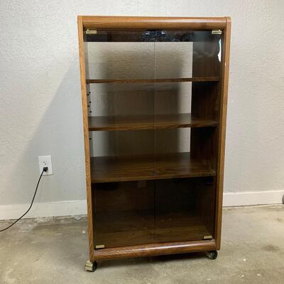 #26 Rolling Media Cabinet With Touch Glass