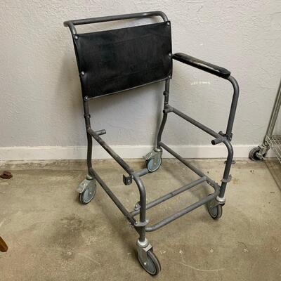 #150 Broken Chair With Wheels