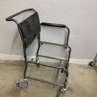 #150 Broken Chair With Wheels