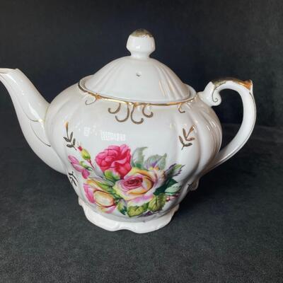 Lot 75  Musical Porcelain Teapot