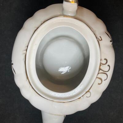 Lot 75  Musical Porcelain Teapot