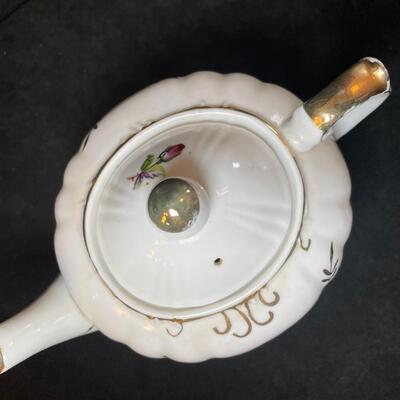 Lot 75  Musical Porcelain Teapot