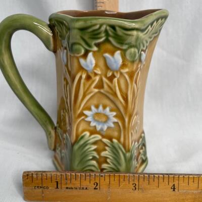 8 silver plated plates, charges, or coasters and English sugar dish and porcelain pitcher