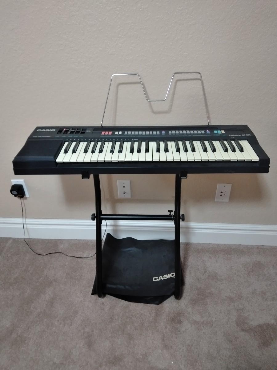 LOT 16 CASIO CT370 KEYBOARD WITH STAND & COVER