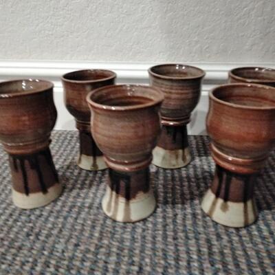 LOT 95  SIX SIGNED CLAY STEMMED GOBLETS