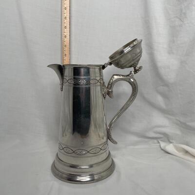 Tall Silver Metal covered pitcher