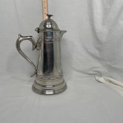 Tall Silver Metal covered pitcher