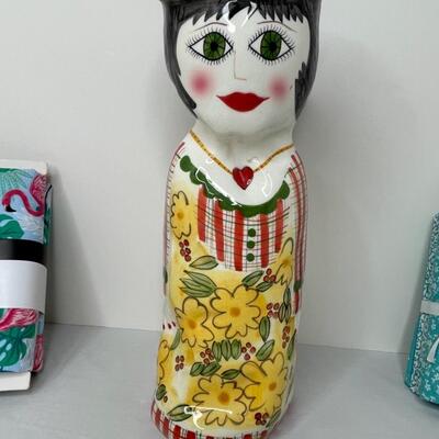 Assorted linens, fabric, trivets, vase