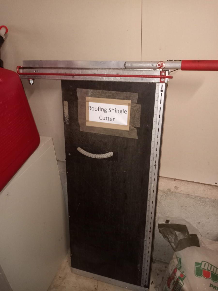 Roofing shingle cutter