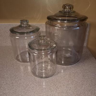 3 large glass canisters with lids