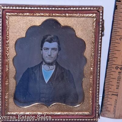 CASED DAGUERREOTYPE with TINTED IMAGE OF MAN