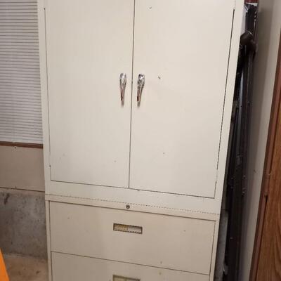 Metal, locking cabinet with drawers