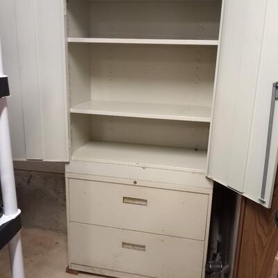Metal, locking cabinet with drawers