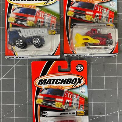 (3)  Matchbox Cars New Dump Truck, Cement Truck Bulldozer