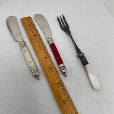 Antique silverware pieces