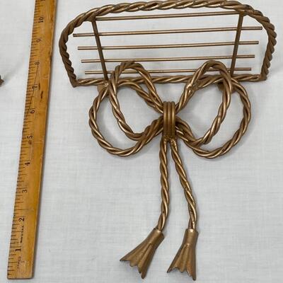 2 gold metal bow shelves