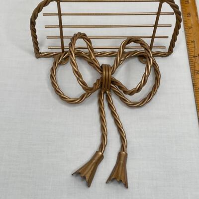 2 gold metal bow shelves