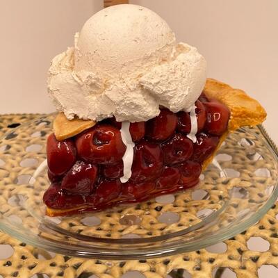 3 pieces metalwork and authenticate cherry pie ala mode on plate