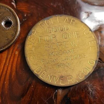 Lot 34: (2) Antique COLORADO Madame Service Tokens