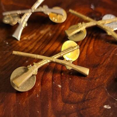 Lot 43: (4) U.S. Military Infantry Service Crossed Rifles Pins