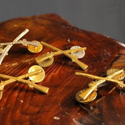 Lot 43: (4) U.S. Military Infantry Service Crossed Rifles Pins