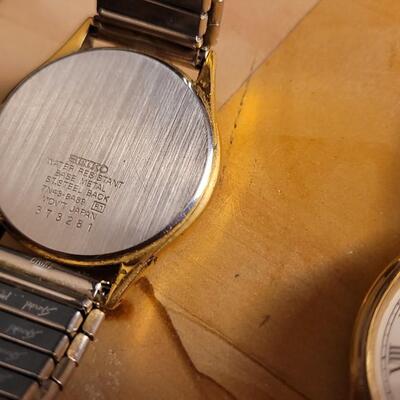 Lot 59: (2) Vintage Quartz Watches - Both Need Battery