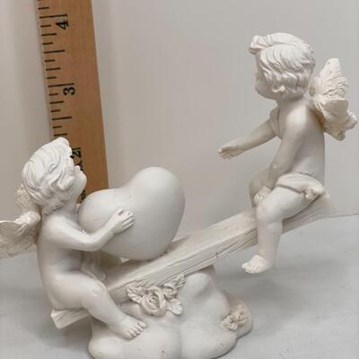 Bisque birds, angels and stand