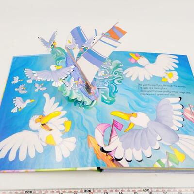 TRAINS, BOATS & PLANES POP-UP BOOK ILLUSTRATED BY GILL GUILE