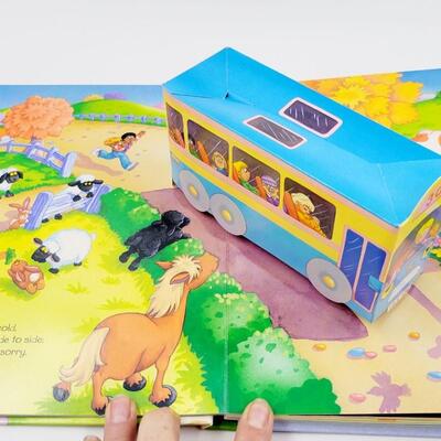 TRAINS, BOATS & PLANES POP-UP BOOK ILLUSTRATED BY GILL GUILE