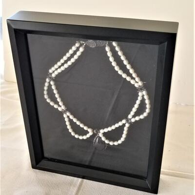 Lot #116  Cabochon Amethyst & Natural pearl festoon necklace in shadow box
