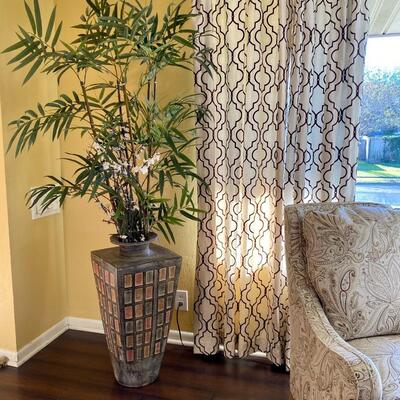 Silk indoor plant and curtain panels