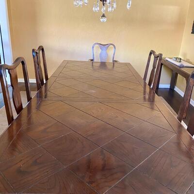 Elegant formal 12' dinning table with 2 leaves for holiday entertaining