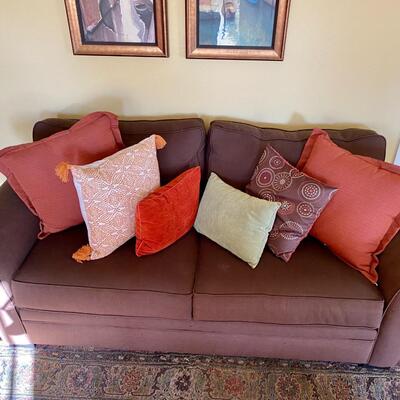 Gently used brown love seat