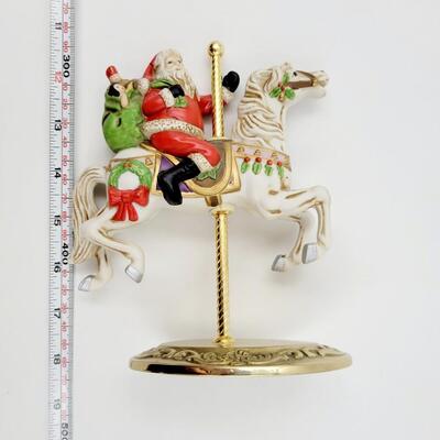 HOMCO SANTA ON A CAROUSEL HORSE DECOR