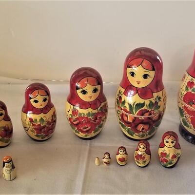 Lot #122 Two Set of Nesting Dolls - traditional and Napoleon