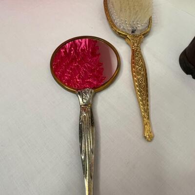 Ladies top, vintage brush and mirror and Anri Carved Monk Brush