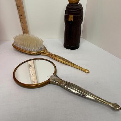 Ladies top, vintage brush and mirror and Anri Carved Monk Brush