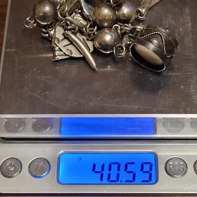 Lot 91: Vintage Mexican Mid Century Sterling Charm Bracelet